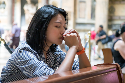 Woman Praying in the Church